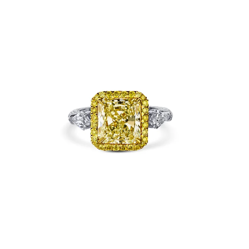 Fancy Light Yellow Radiant Diamond Halo Platinum Engagement Ring With Accent Kite-Cuts