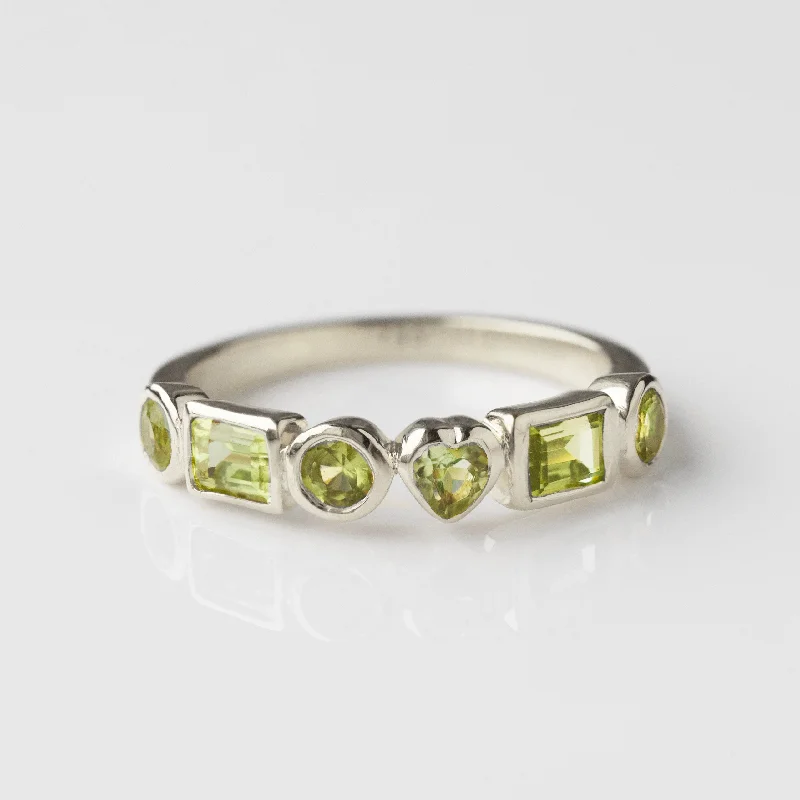 celestial zodiac sign necklace Louise Thompson Lucky In Love Peridot Ring