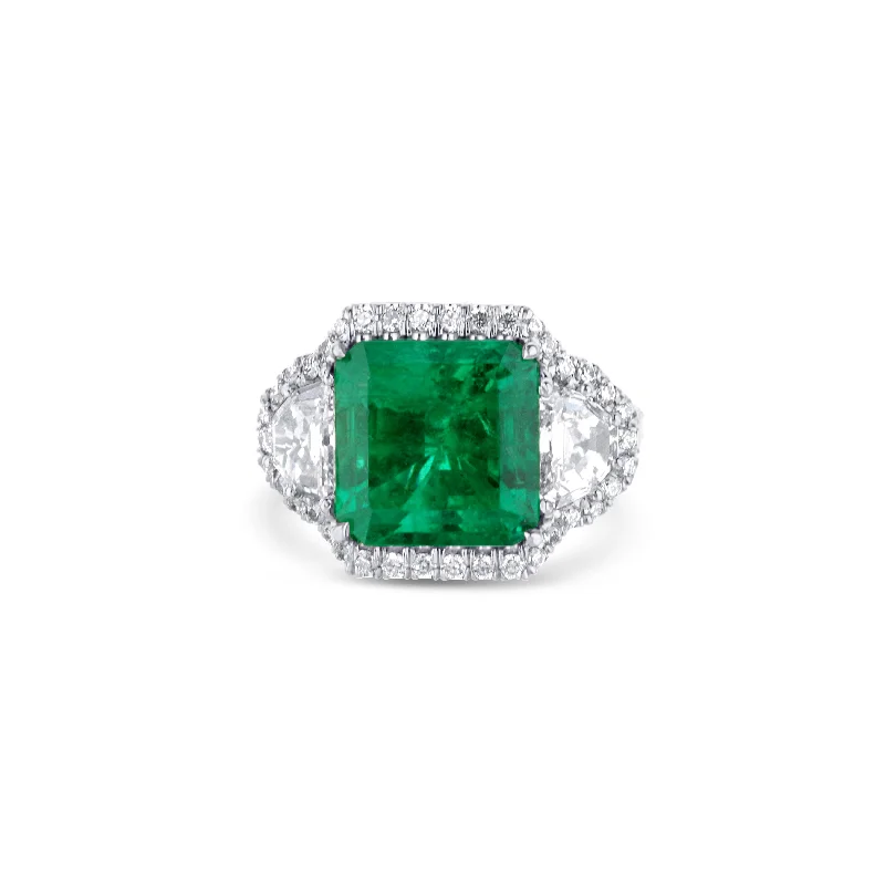 Platinum Emerald-Cut Emerald Engagement Ring With Hexagon-Cut Diamond Accents And Diamond Halo