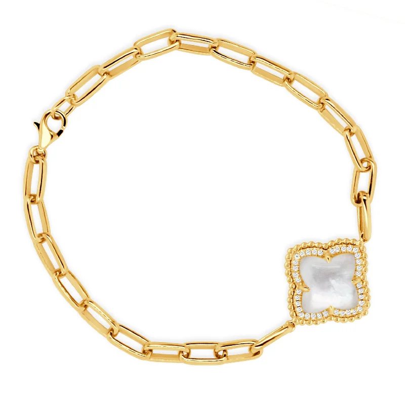 18K YELLOW GOLD DIAMOND BRACELET WITH WHITE MOTHER OF PEARL CENTER ON PAPER CLIP CHAIN.