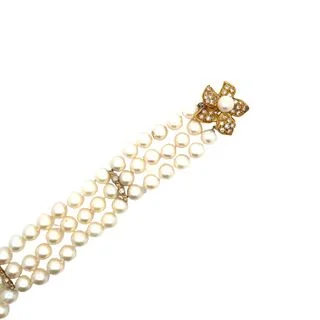 classic gold cuff bracelet Triple Strand bracelet with flower clasp