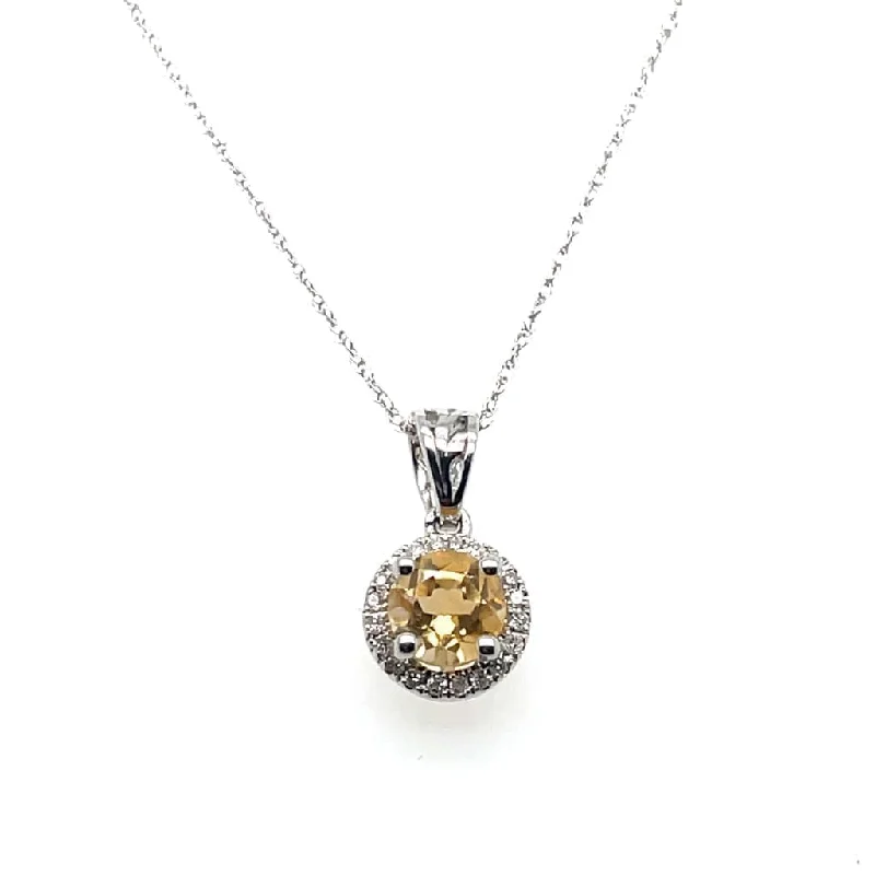 Beautiful Honey Citrine Set in a Diamond Halo Pendant at Regard Jewelry in Austin, Texas