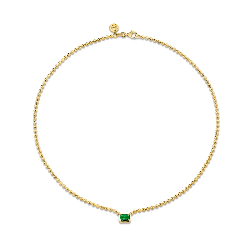 colorful gemstone engagement ring Emerald Cut Emerald on Orb Chain Necklace