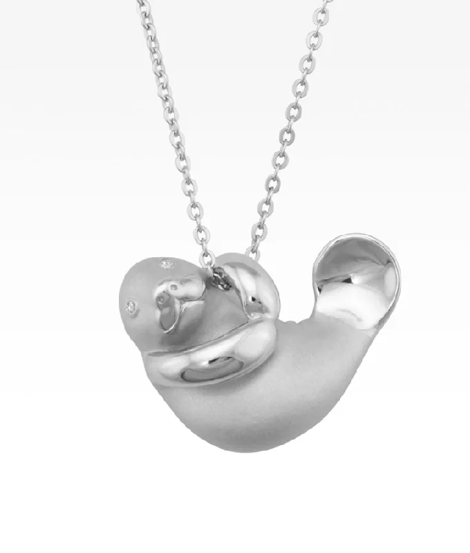 infinity couple’s ring matching set Manatee Hug Necklace