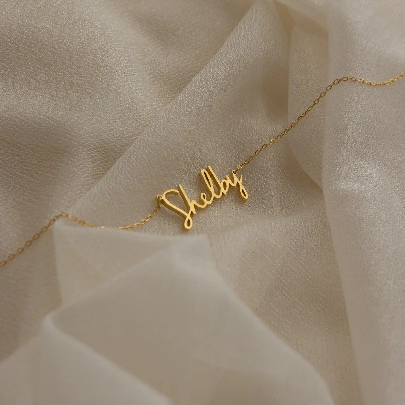 classic silver pearl earrings Nella Name Necklace