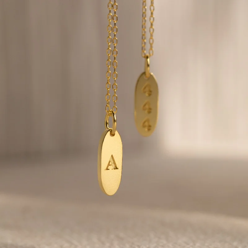unique blue topaz ring Newsletter Oval Tag Necklace