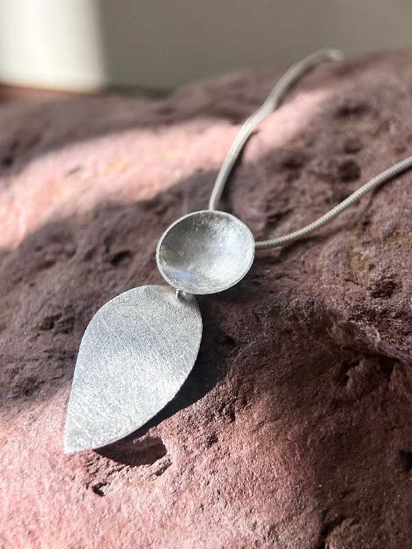 vintage emerald cocktail ring Round and Petal Brushed Silver Pendant